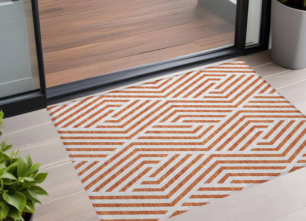 3' X 5' Orange and White Geometric Washable Non Skid Indoor Outdoor Area Rug N270-562347