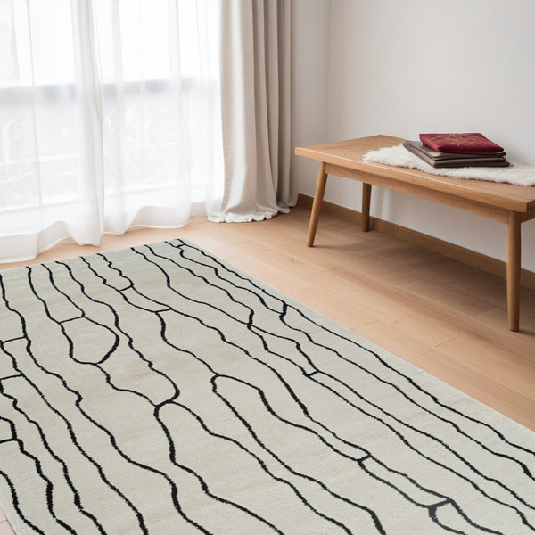 5' X 8' Cream and Black Abstract Distressed Area Rug N270-559033