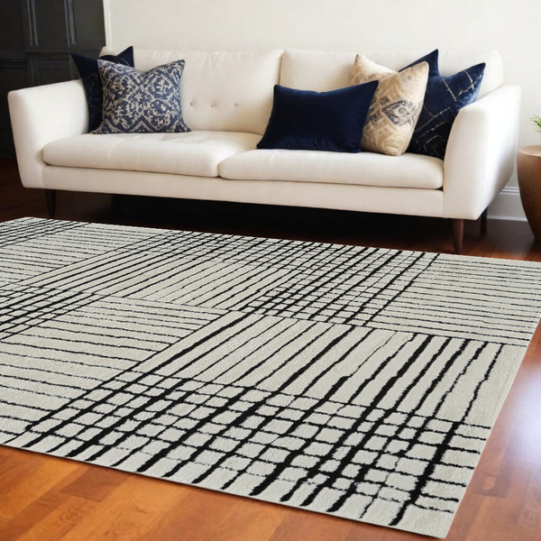 8' X 11' Cream and Black Abstract Distressed Area Rug N270-559023
