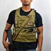 Strike Industries SI-SLING-CATCH Sling Catch, tactical gear accessory on person wearing a tactical vest.