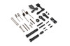 Strike Industries SI-AR10-E-LRPLT AR-10 Enhanced Lower Receiver Parts, assorted metal and polymer components including pins, springs, and plates for firearm assembly or repair.