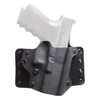 BlackPoint Tactical Leather WING Holster for Glock 19/23/32, showcasing a black leather holster with metal screws designed for ultimate comfort and concealment, with a semi-automatic pistol partially inserted.