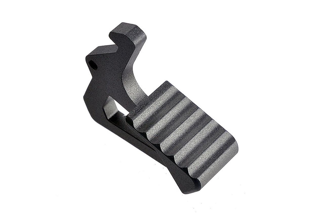 Strike Industries SI-AR-LATCH-BK Charging Handle Extended Latch in Black, close-up view of the black tactical firearm accessory with textured grip for easy manipulation.