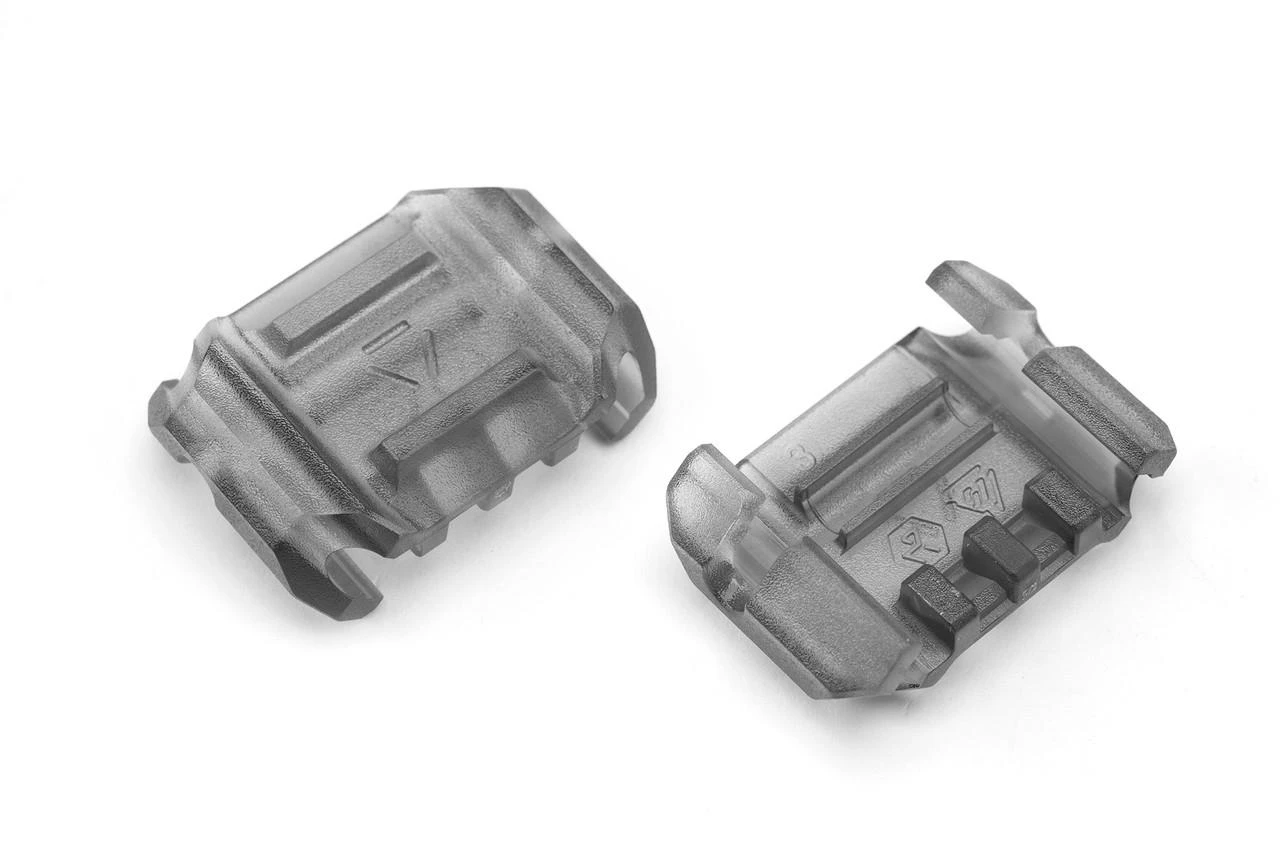 Strike Industries SI-AR-CMS-MP Multidirectional Picatinny Rail Cover with Cable Management System, 6pcs pack, transparent with black rubber padding for firearm rail protection and cable organization.