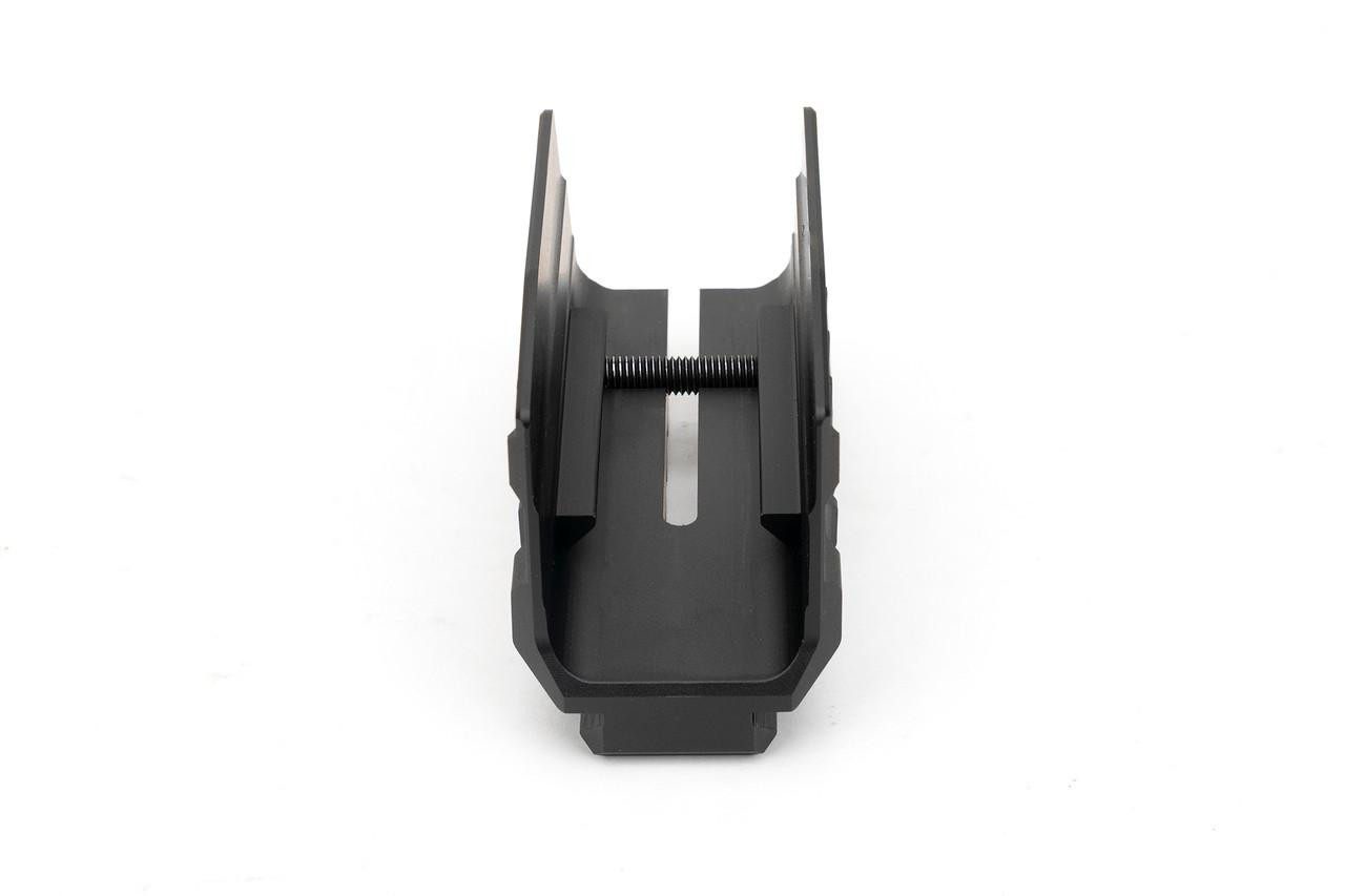 Strike Industries SI-SMC-BS-S Blast Shield for Modular Chassis (SMC) - ALPHA, black blast shield for firearm chassis, with mounting features and durable construction.