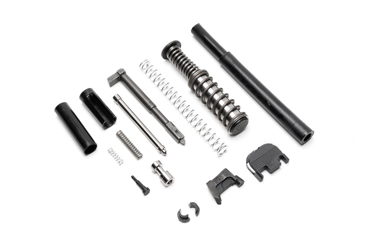 Strike Industries SI-G-SLIDEKIT-26 Slide Completion Kit for GLOCK G26 GEN3-4, image showing a disassembled slide kit with various metal and polymer parts on a white background.