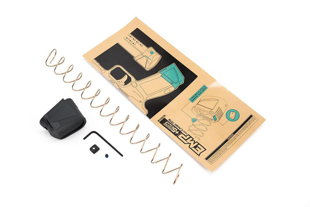 Strike Industries SI-EMP-CTP9 Extended Magazine Plate for CANIK TP9 (9mm), disassembled with spring, base plate, and installation tool.