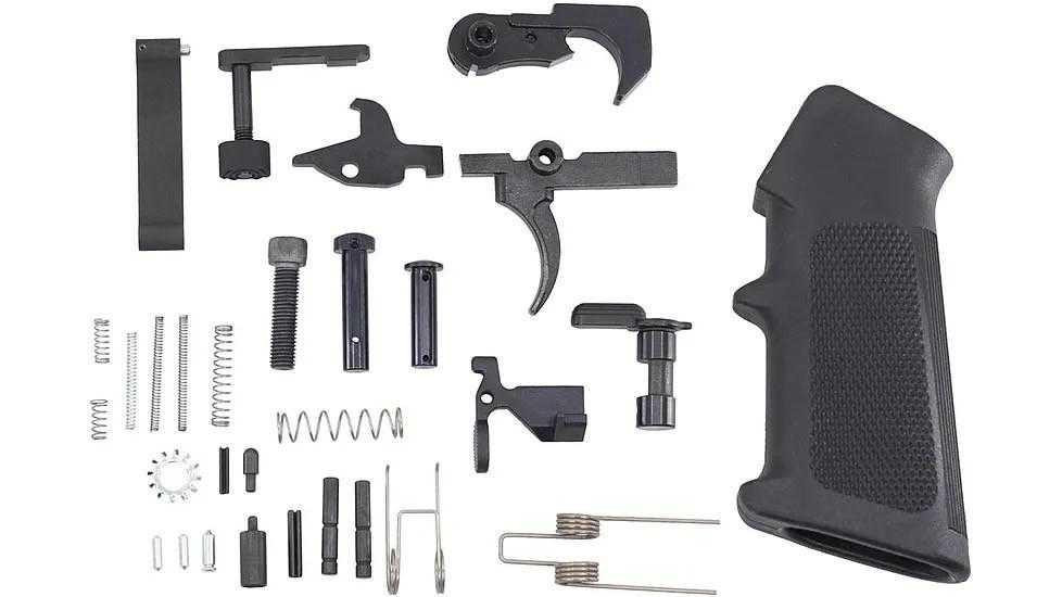 JE Machine Tech JE Machine TS-LPKAR15-RSS Lower Parts Kit with Regular Safety Selector, black firearm lower parts kit with various small metal components, springs, pins, and a black polymer grip.