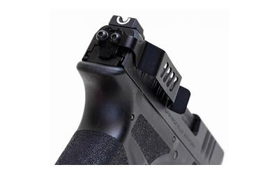 Techna Clip Springfield Hellcat Black, close-up image showing the accessory attached to a handgun's slide for convenient carrying and concealment.
