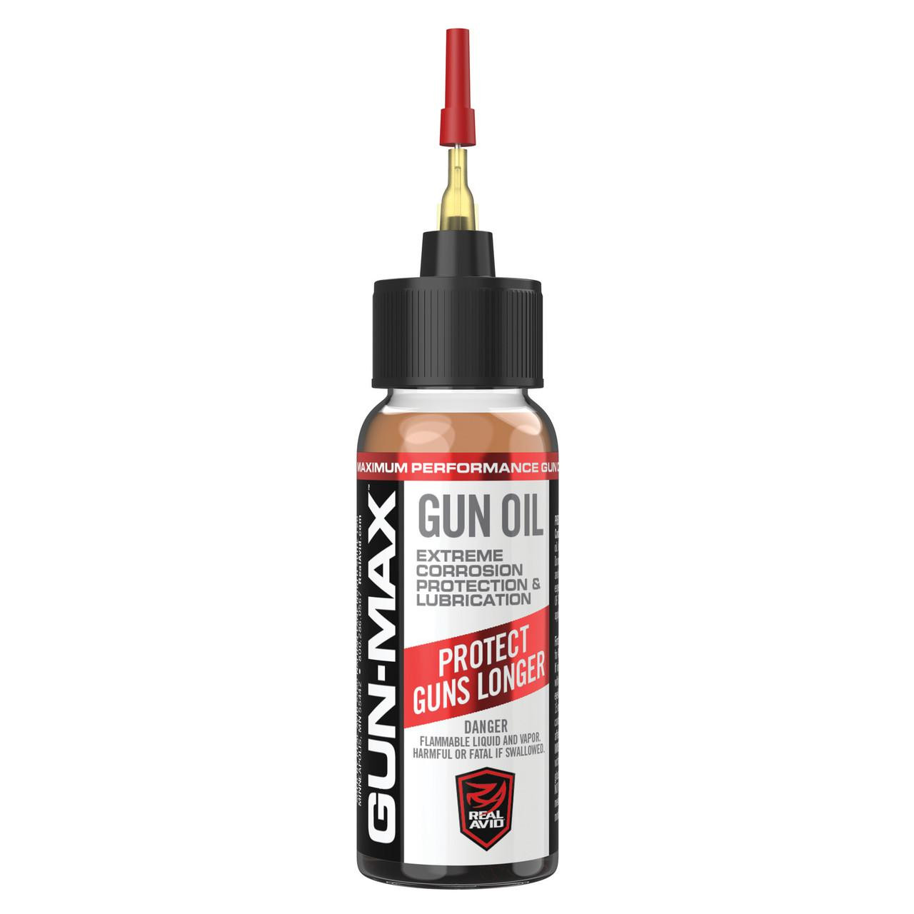Real Avid GUN MAX GUN OIL 1OZ, a small bottle of gun oil with a red applicator tip for lubrication and corrosion protection.