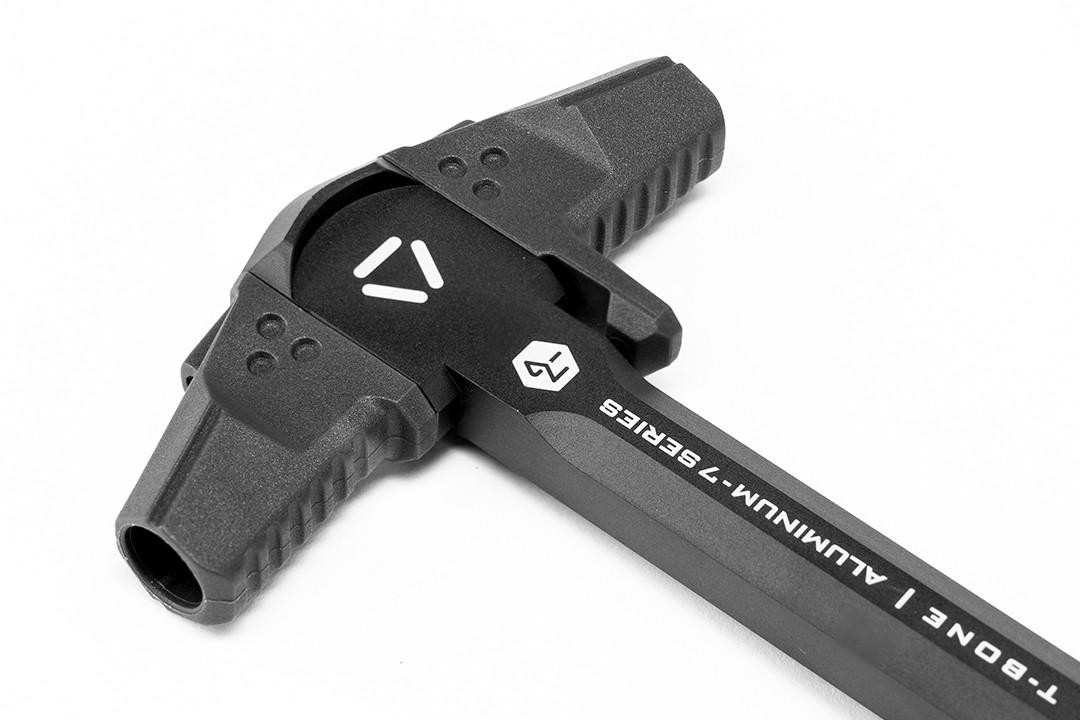 Strike Industries T-Bone Charging Handle for .223/5.56, black color with white branding and textured grips.