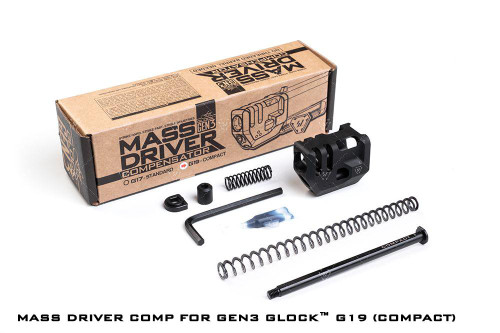 Strike Industries SI-G3-MDCOMP-C G3 Mass Driver Comp - Compact for Glock 19, demonstrating the compact muzzle device alongside its packaging and installation parts.
