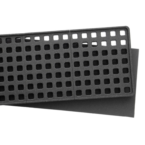 Magpul Industries MAGPUL DAKA GRID ORG PELICAN 1750, a black storage organizer with a grid pattern of square holes for versatile storage options.