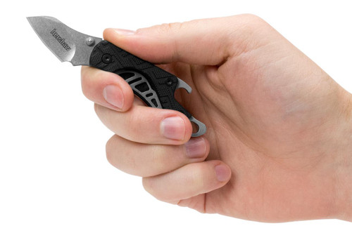 Kershaw 1025X Cinder Folding Knife 1.4" Blade Stonewashed Finish, handheld with black textured handle and silver blade.