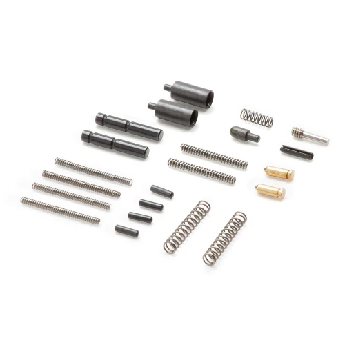 LanTac USA LLC 01-PKIT-FR AR-15 Assembly Kit - Precision Engineered for Ultimate Performance & Compatibility, showing various small black and metallic gun parts, springs, pins, and tools arranged on a white background.