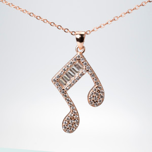 18Kt Rose Gold Plated Necklace with Musical Note Pendant with Various Cut White Gemstones