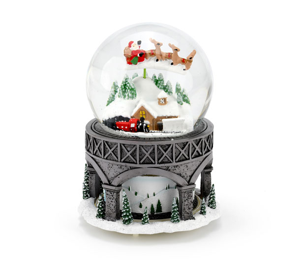 Christmas themed music box snow globe