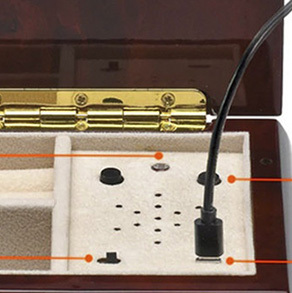 cord inserted into music box