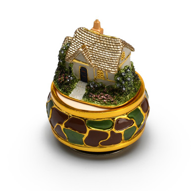 A Glamorous Gold Accent English Cottage Rotating Musical Keepsake