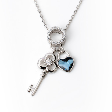 Platinum Plated Necklace with Key and Blue Heart Gemstone Pendant