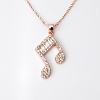 18Kt Rose Gold Plated Necklace with Musical Note Pendant with Various Cut White Gemstones