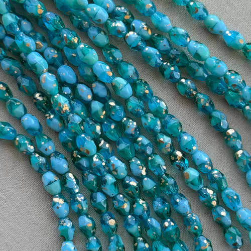 7x5mm Faceted Oval Beads Fire Polish Czech Glass Speckled Gold Lagoon Marble 20Pcs Per Strand