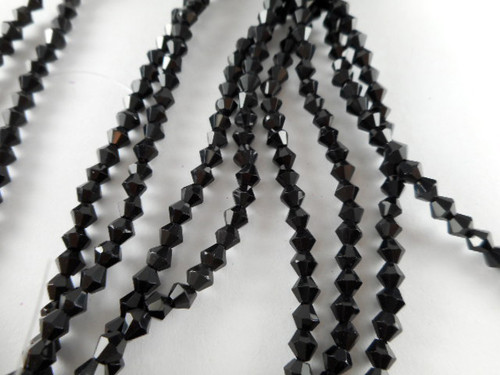 Black Ruffled Disc Sea Glass Beads - per strand