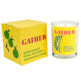 Heaven Scent Modern Botanical Gather candle in glass jar next to its yellow box with botanical illustration. Scent notes: Bergamot, Pink Pepper and Frankincense. Vegan soy wax.