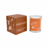 Heaven Scent Modern Botanical Snuggle candle in glass jar next to its brown box with botanical illustration. Scent notes: Amber, Wood and Vanilla. Vegan soy wax.