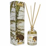 Heaven Scent 100ml reed diffuser in Winter Ramble scent. The clear apothecary glass bottle is illustrated with a hedgehog, beside a tall illustrated gift box showing a hedgehog amongst birch trees. The fragrance is black cherry.
