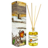 Heaven Scent 100ml reed diffuser in Cold Still Days scent. The clear apothecary glass bottle is illustrated with a robin, beside a tall illustrated gift box showing a robin and a country church in the snow. The fragrance is nutmeg orange and cinnamon.