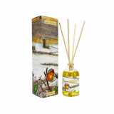 Heaven Scent 100ml reed diffuser in Autumn Days scent. The clear apothecary glass bottle is illustrated with acorns and toadstools, beside a tall illustrated gift box showing a field and hedgerow pattern with autumn leaves. The fragrance is field and hedgerow.