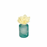 Empty vintage style green/blue ribbed bottle for reed diffusers, posies and decoration, shown with Jasmine Sola Flower