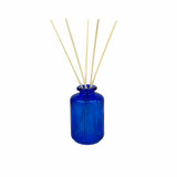 Empty vintage style blue knit-effect bottle for reed diffusers, posies and decoration show with natural reed sticks