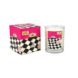 Caffe Martini scented 20cl candle in clear glass alongside an illustrated gift box. The artwork by Sarah Pettitt depicts a glamorous hand reaching for an espresso martini cocktail set against a bold black and white chequered tablecloth and vibrant pink background.