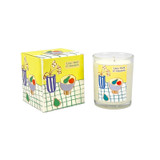 Lime, Basil & Mandarin scented 20cl candle in clear glass alongside its illustrated gift box. The artwork by Sarah Pettitt features a blue striped vase and a bowl of fruit on a green chequered surface with a yellow background.