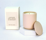 A Heaven Scent Lavender, Sweet Orange & Geranium scented artisan candle in a pale pink ceramic pot with a lid, handcrafted from natural vegan soy wax.