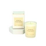 Amber and Tonka Bean vegan soy wax candle in a white frosted glass votive, presented with a beautiful luxury gift box.