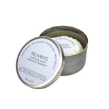 Heaven Scent natural vegan shaving soap bar inside an open metal travel tin featuring a pale lilac heritage label, titled Relaxing and scented with Lavender, Sweet Orange and Geranium.