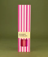 A beautifully illustrated, pink and white stripy gift box for Heaven Scent's The Pink Edit mixed dinner candles, displayed alongside six straight, hand-poured artisan dinner candles in complementary shades of Pastel Pink, Raspberry Pink and Bubblegum Pink.