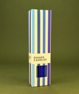 A beautifully illustrated, blue-striped gift box for Heaven Scent's The Blue Edit mixed dinner candles, displayed alongside six straight, hand-poured artisan dinner candles in complementary shades of Pastel Blue, Navy Blue and Charcoal Grey.