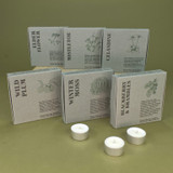 Heaven Scent Elder Flower box of 9 natural, vegan, plant-based and soy wax hand-poured tealights in aluminium cases, made in the UK next to its illustrated presentation box.