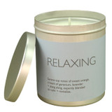 Relaxing 200ml Travel Tin candle from the Modern Heritage collection, shown with the lid off and a beautiful pale blue label.