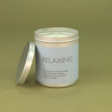 Relaxing 200ml Travel Tin candle from the Modern Heritage collection, shown with the lid off and a beautiful pale blue label.