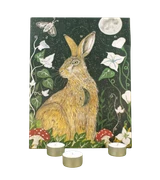 The Hare 12-Day Christmas Tealight Advent Calendar featuring an illustrated hare and woodland design by Sarah Pettitt, displayed alongside three individual tealights in aluminium cups.