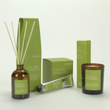 Lime, Basil & Mandarin 20cl amber glass scented candle, 100ml Reed Diffuser and 60ml Cocoa & shea butter Hand Cream from the Modern Heritage collection, shown with their gift boxes.