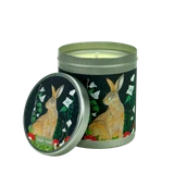 Winter Scent 200ml candle tin featuring a hare illustrated amongst ivy, white flowers and red toadstools.