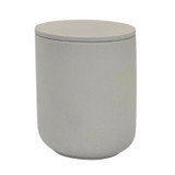 Oud and Tobacco Leaf scented candle in a light grey ceramic pot with matching lid alongside a gift box