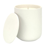 Shiso, Vetiver and Frankincense scented candle in a white ceramic pot with matching lid alongside a gift box