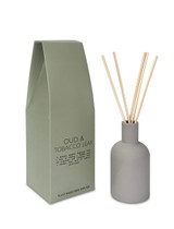 Oud & Tobacco Leaf 100ml scented artisan reed diffuser ceramic bottle. Made with natural, alcohol plant-based reed liquid with no parabens, in a colour-matched gift box